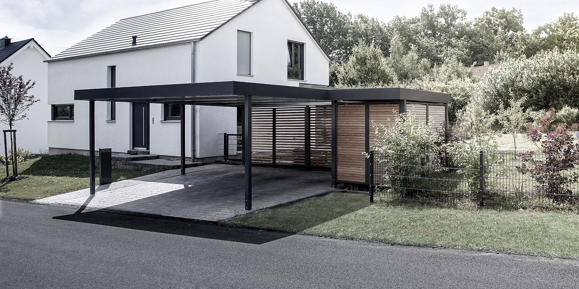 UNINORM – Carports, Einhausungen, Fertiggaragen, Garagentore